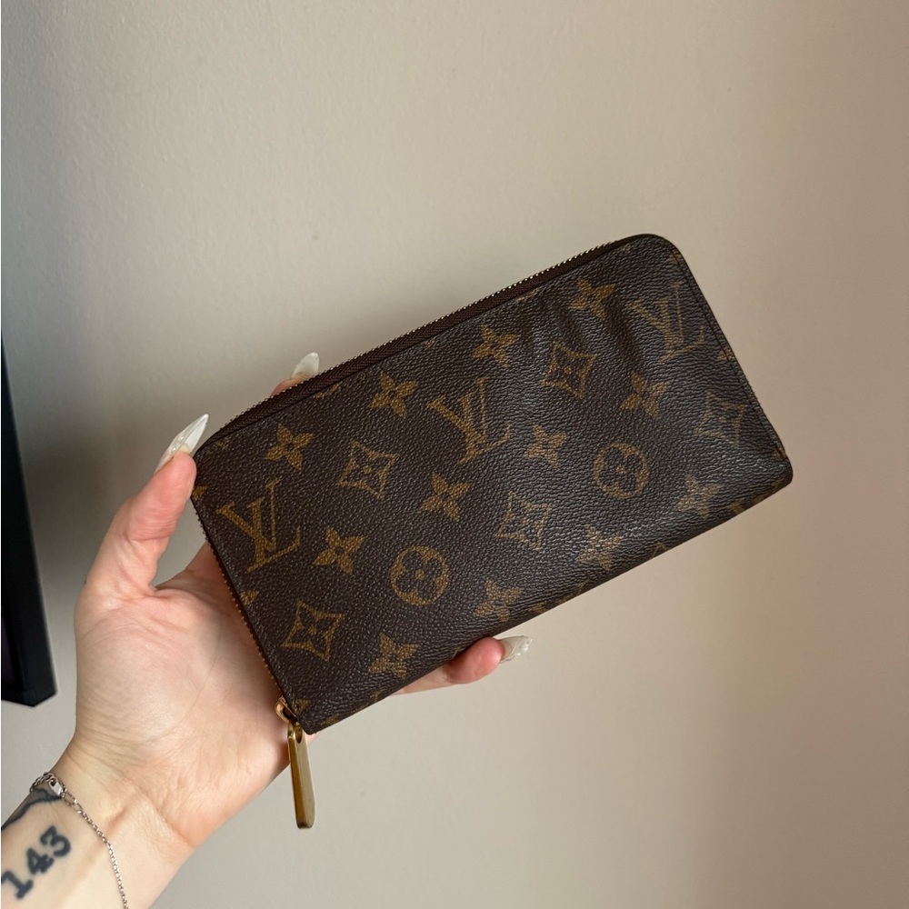 Louis Vuitton Monogram Zipper Wallet in Brown